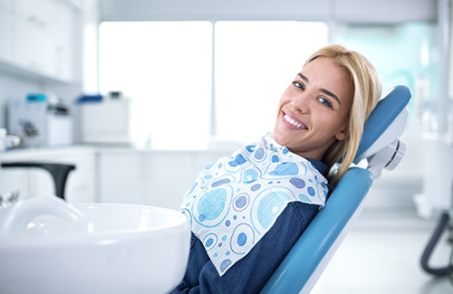 Child smiling at dental checkup